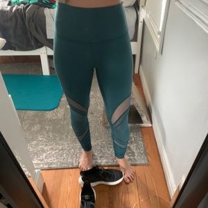 Teal/blue lululemon leggings with mesh